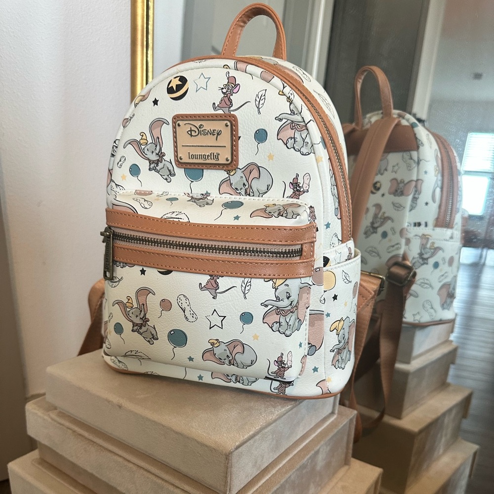 Loungefly Disney Dumbo Allover Print Backpack with Padded Sleeves